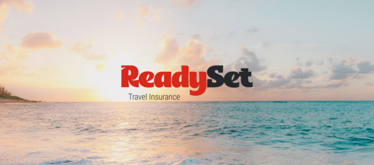 ReadySet Travel Insurance logo over a sunset ocean